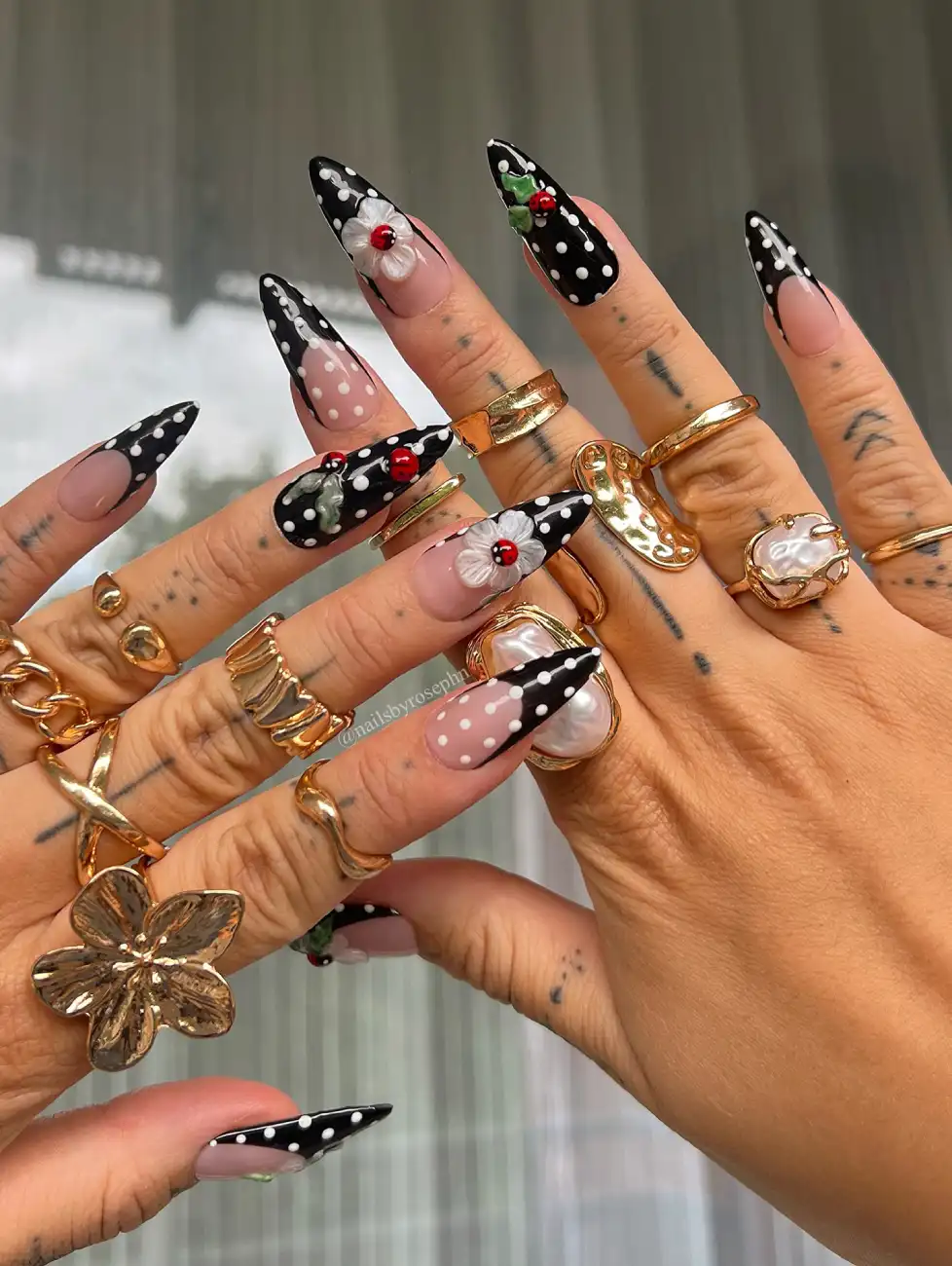 Black Polka Dot Nails with Floral Accents View