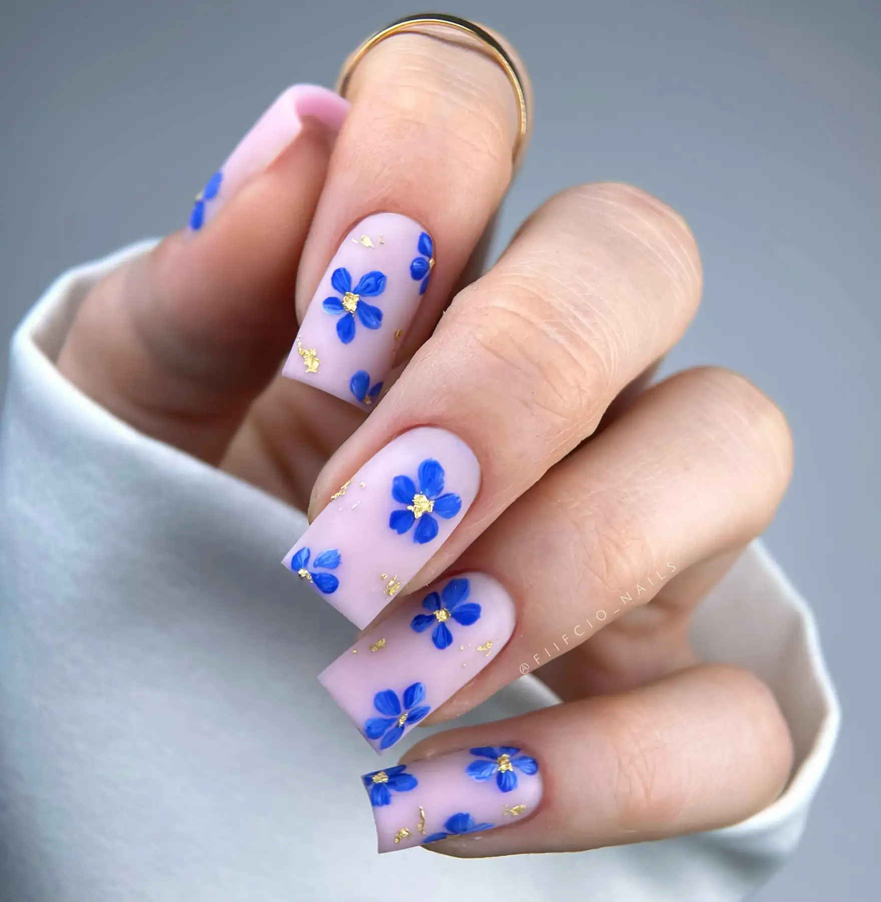 Matte Lilac Nails with Blue Flowers View
