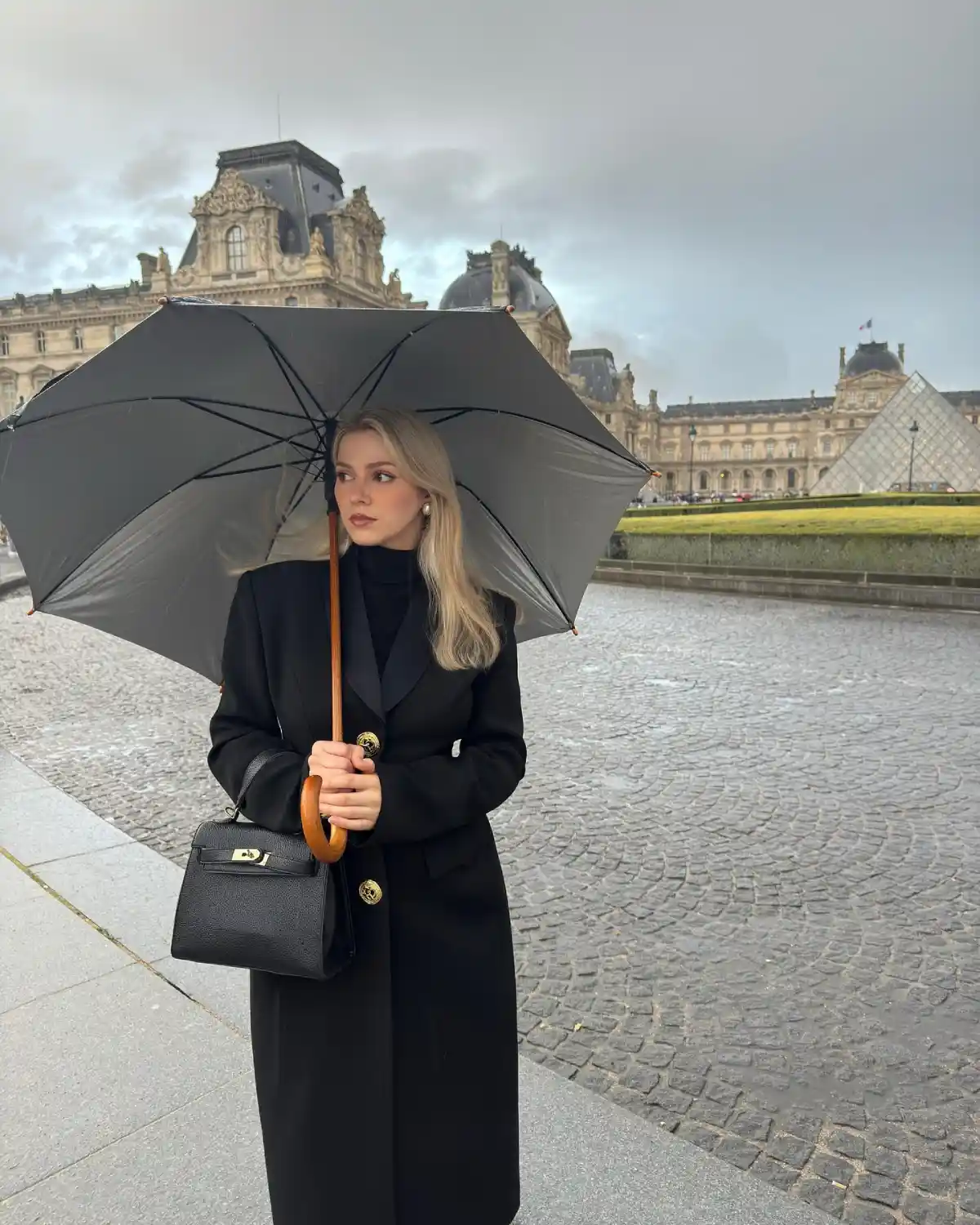 A Rainy Day Outside the Louvre Main View