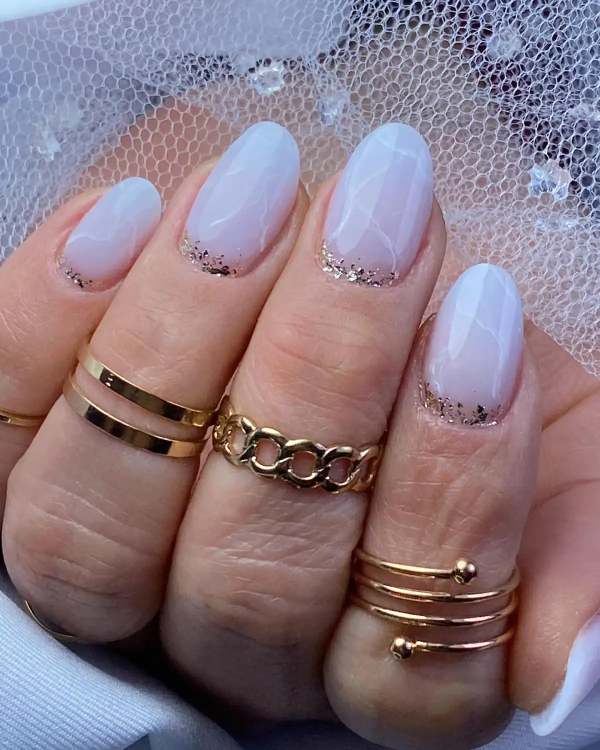 Marble Accent With Gold Line Nails Main View