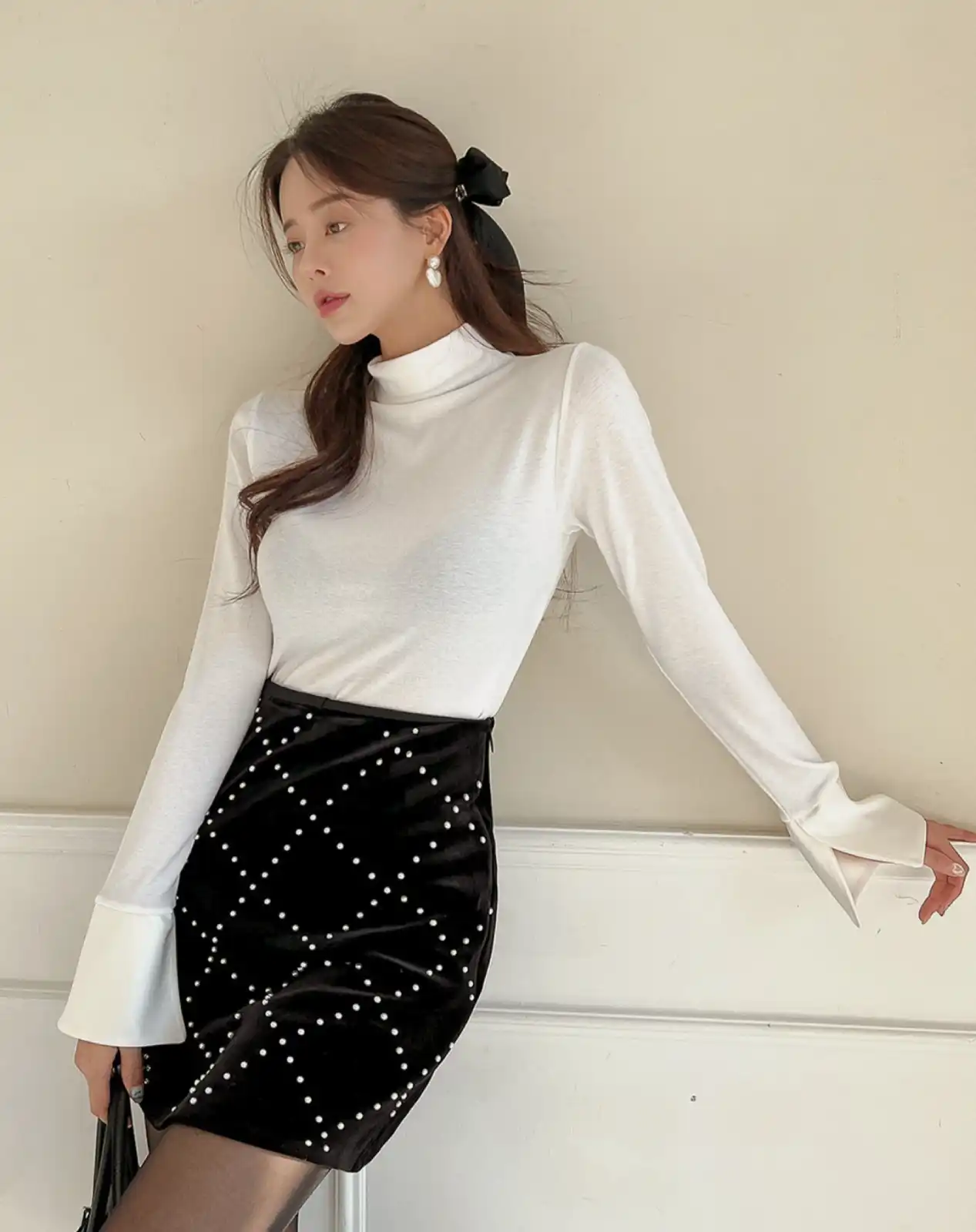 Pearl Mini with a White Turtleneck Thumbnail 2