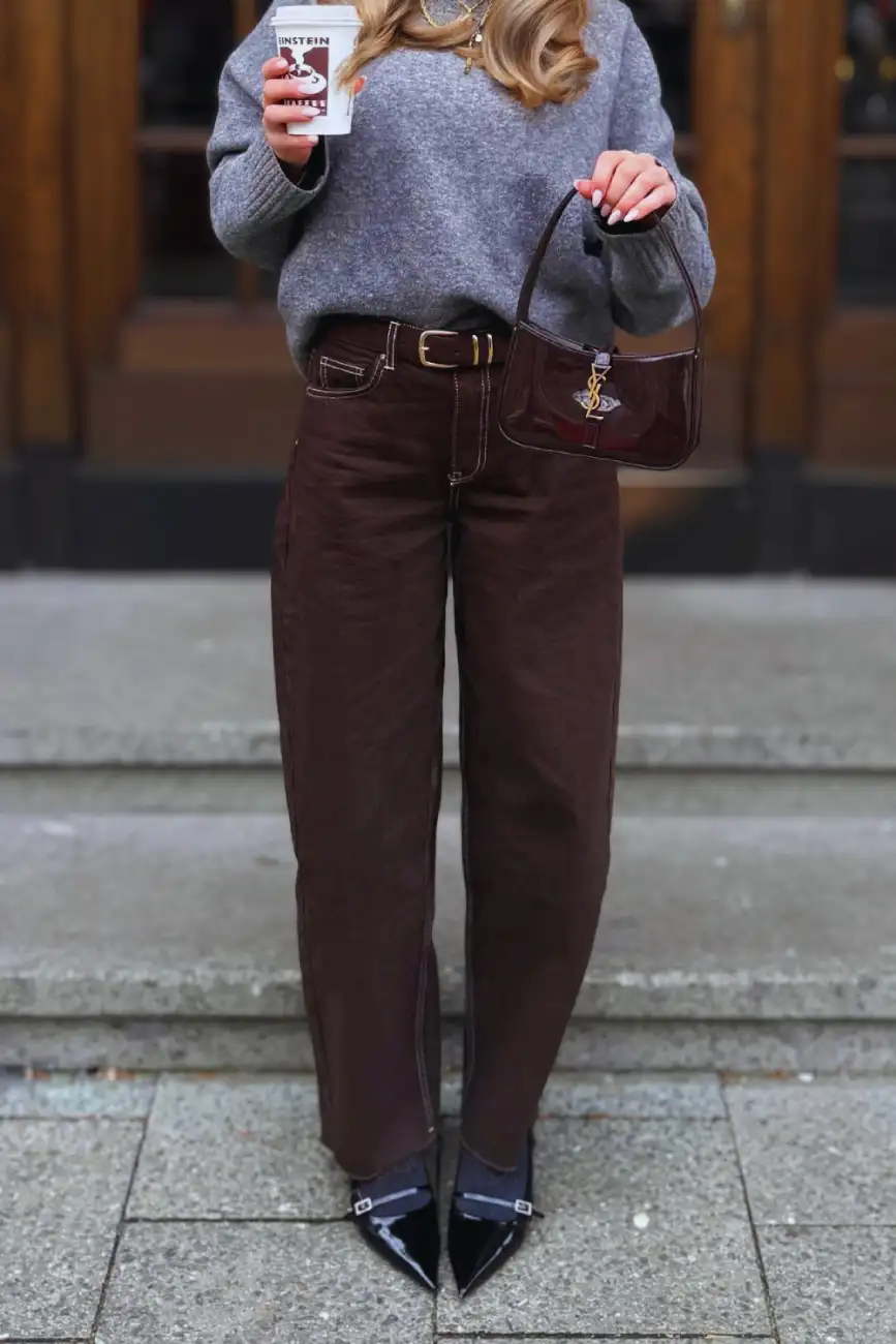 Chic fall outfit featuring a gray sweater, wide-leg chocolate brown pants, and a mini dark brown handbag - Inspiration 4