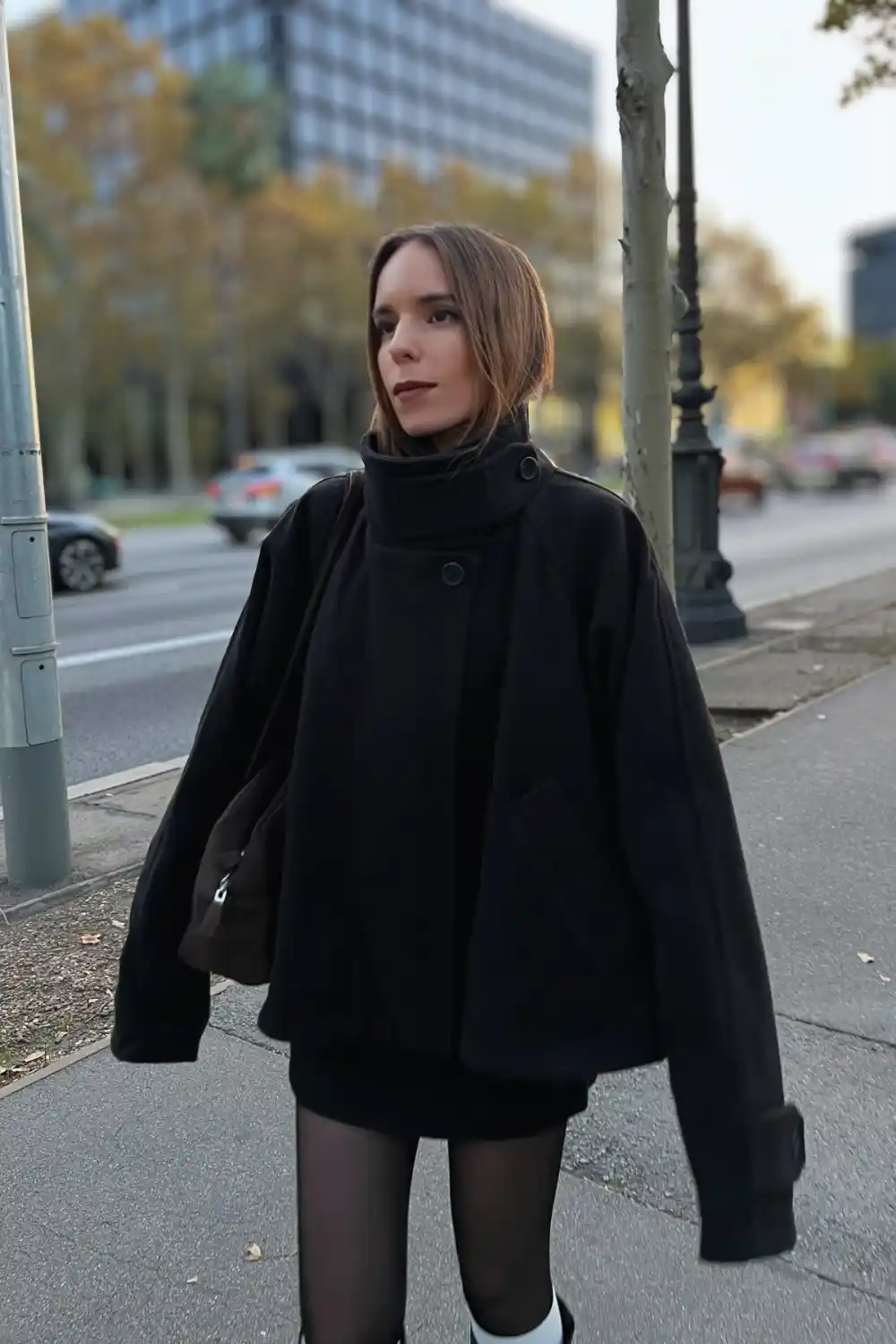 Black Leather Jacket With a Mini Skirt and Tall Boots - Inspiration 4