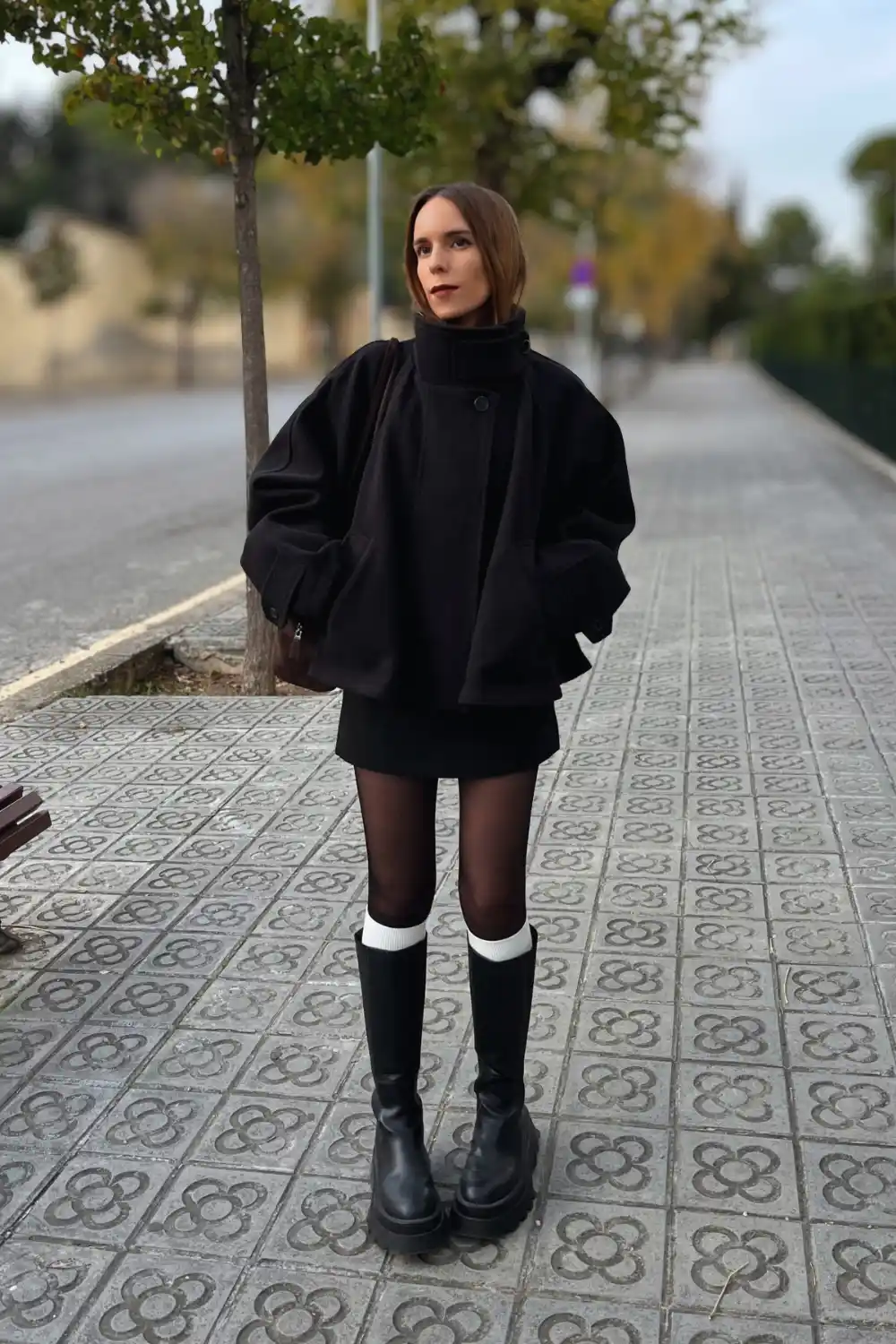 Black Leather Jacket With a Mini Skirt and Tall Boots - Inspiration 3
