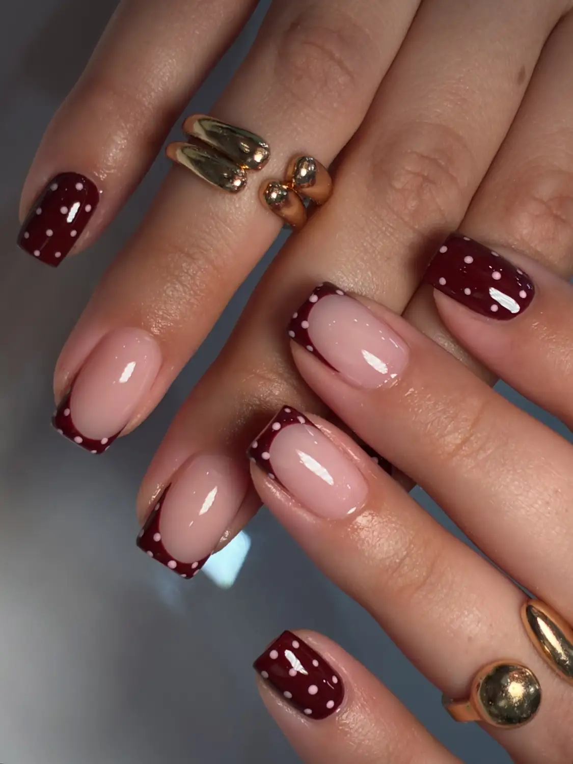 Burgundy nails featuring polka-dot French tips - Design 3 - Nail inspiration 3