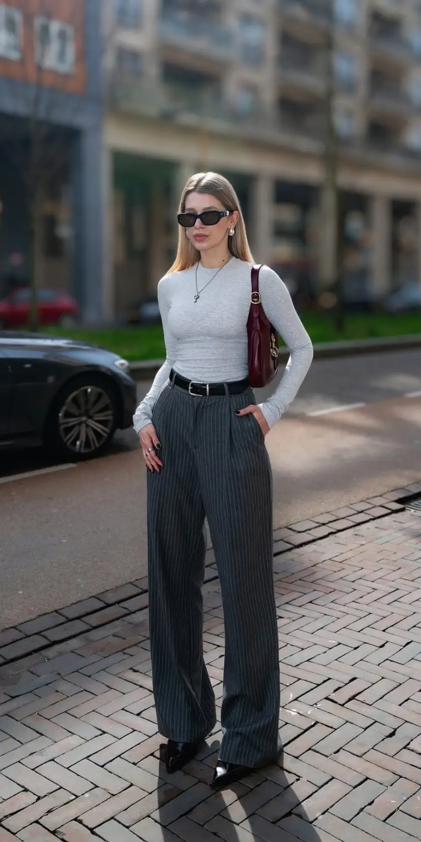 Grey Pinstripe Trousers With a Fitted Top inspiration - Inspiration 3