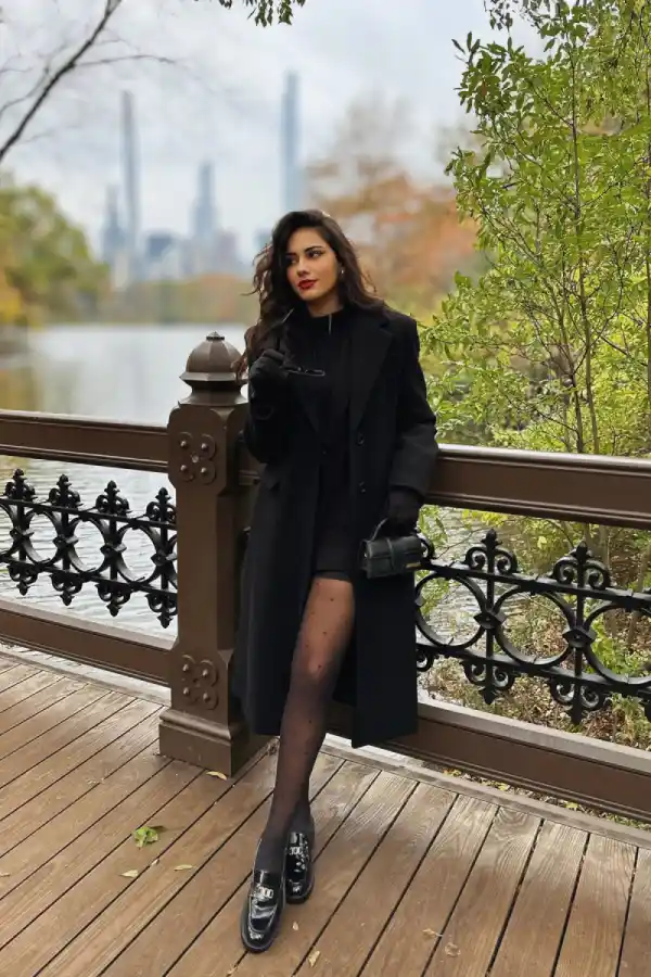 Long Black Coat With a Mini Skirt and Loafers - Inspiration 3