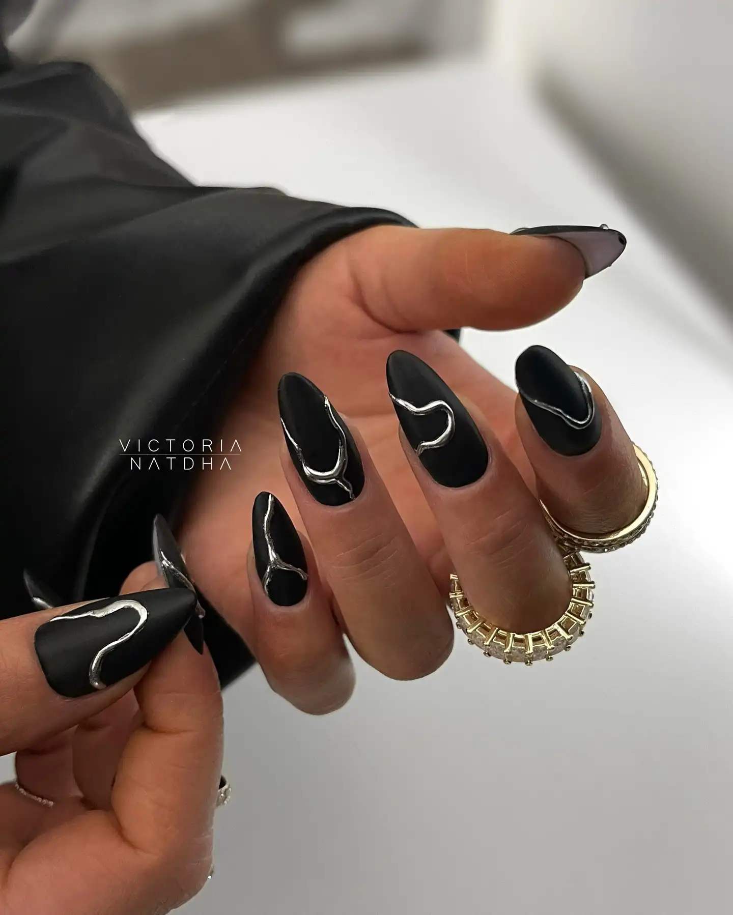 Matte Black Nails With Silver Chrome Swirls - Inspiration 3