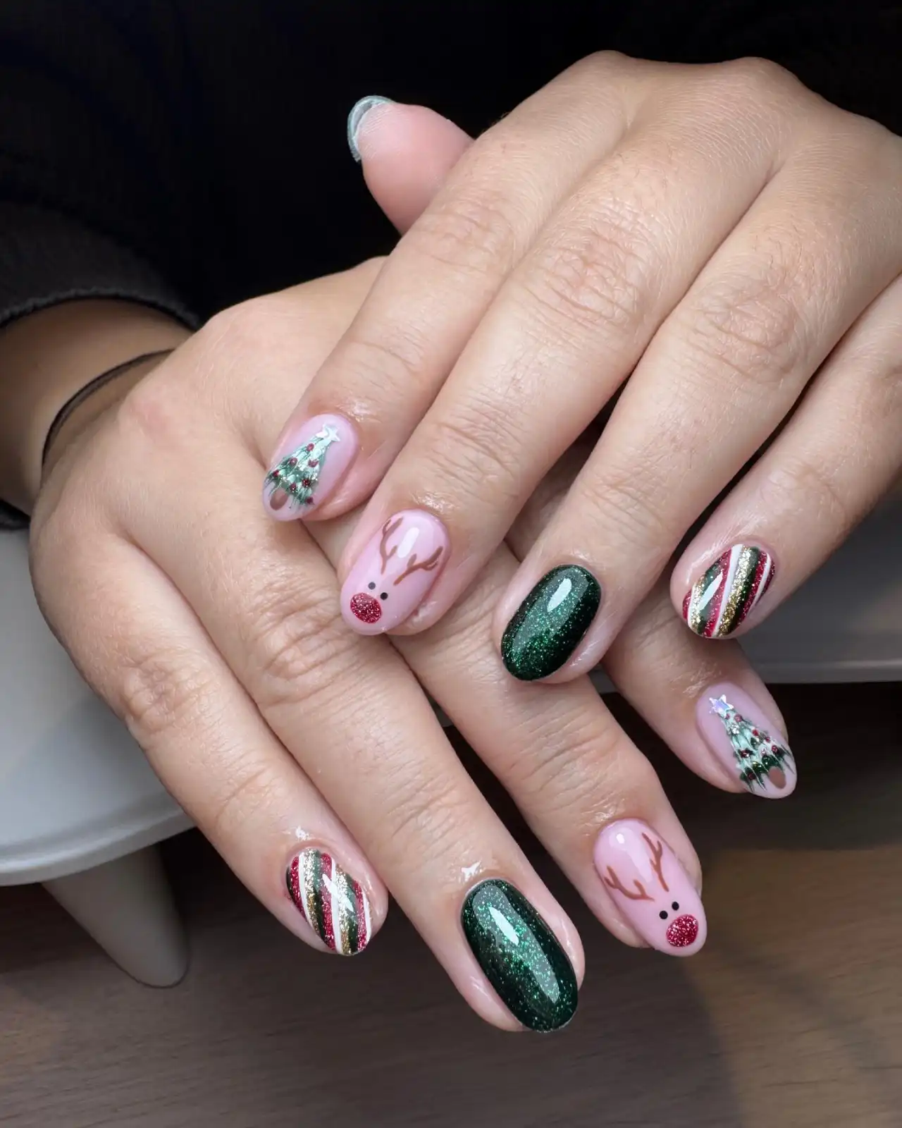 Pink and green reindeer Christmas nail design, photo 1 of 2